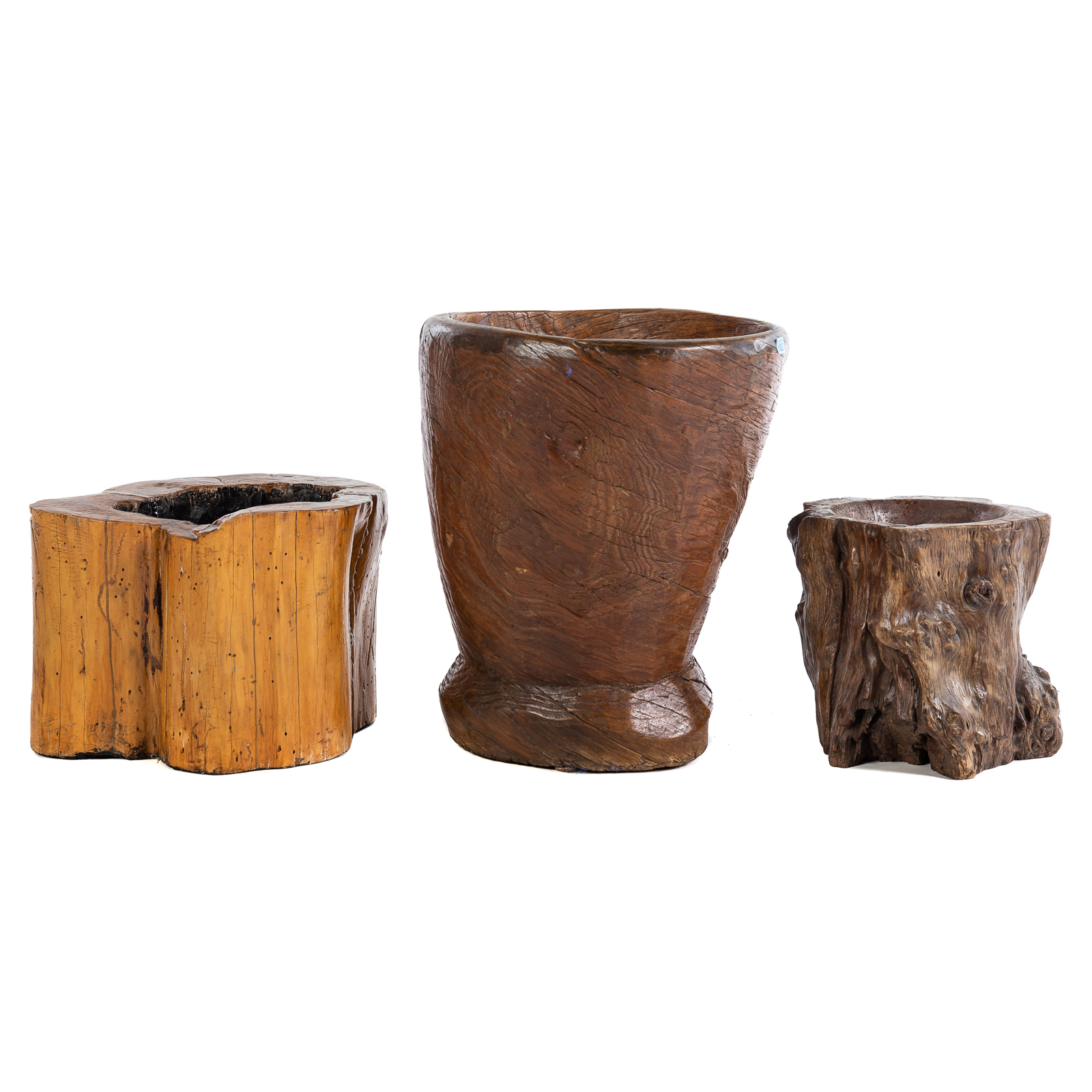 THREE CARVED TREE TRUNK PLANTERS