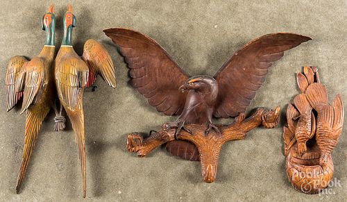 THREE CARVED WALL HANGINGSThree