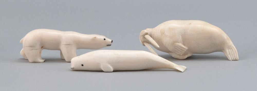 THREE CARVED WALRUS IVORY