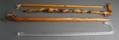 THREE CARVED WOOD AND ONE ACRY