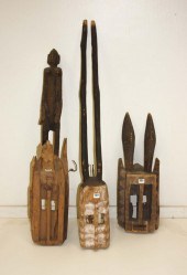 THREE CARVED WOOD DOGON MASKS,