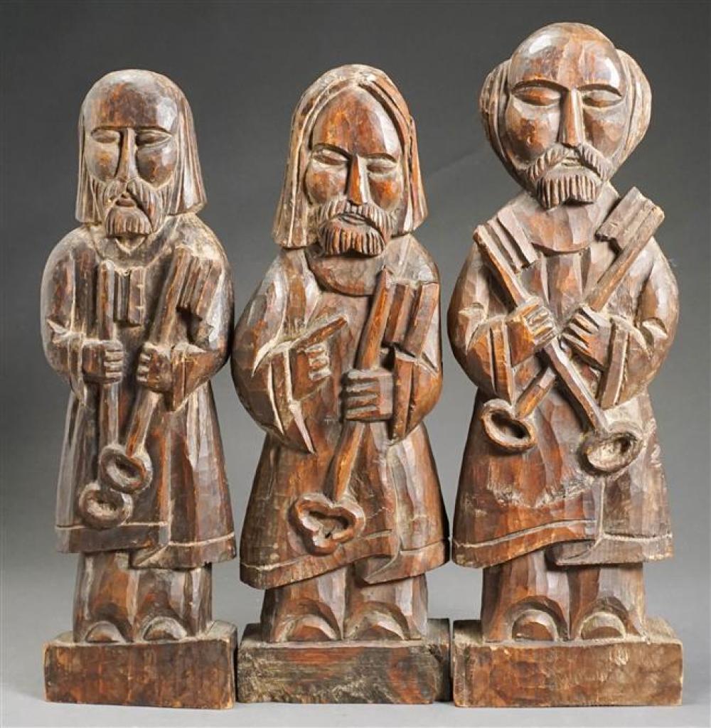 THREE CARVED WOOD FIGURES OF