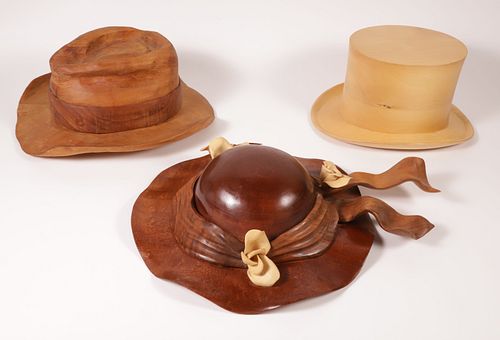 THREE CARVED WOOD HATS, 20TH