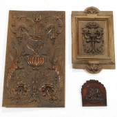 THREE CARVED WOOD PANELS  One