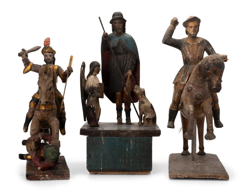 THREE CARVED WOOD SANTOS