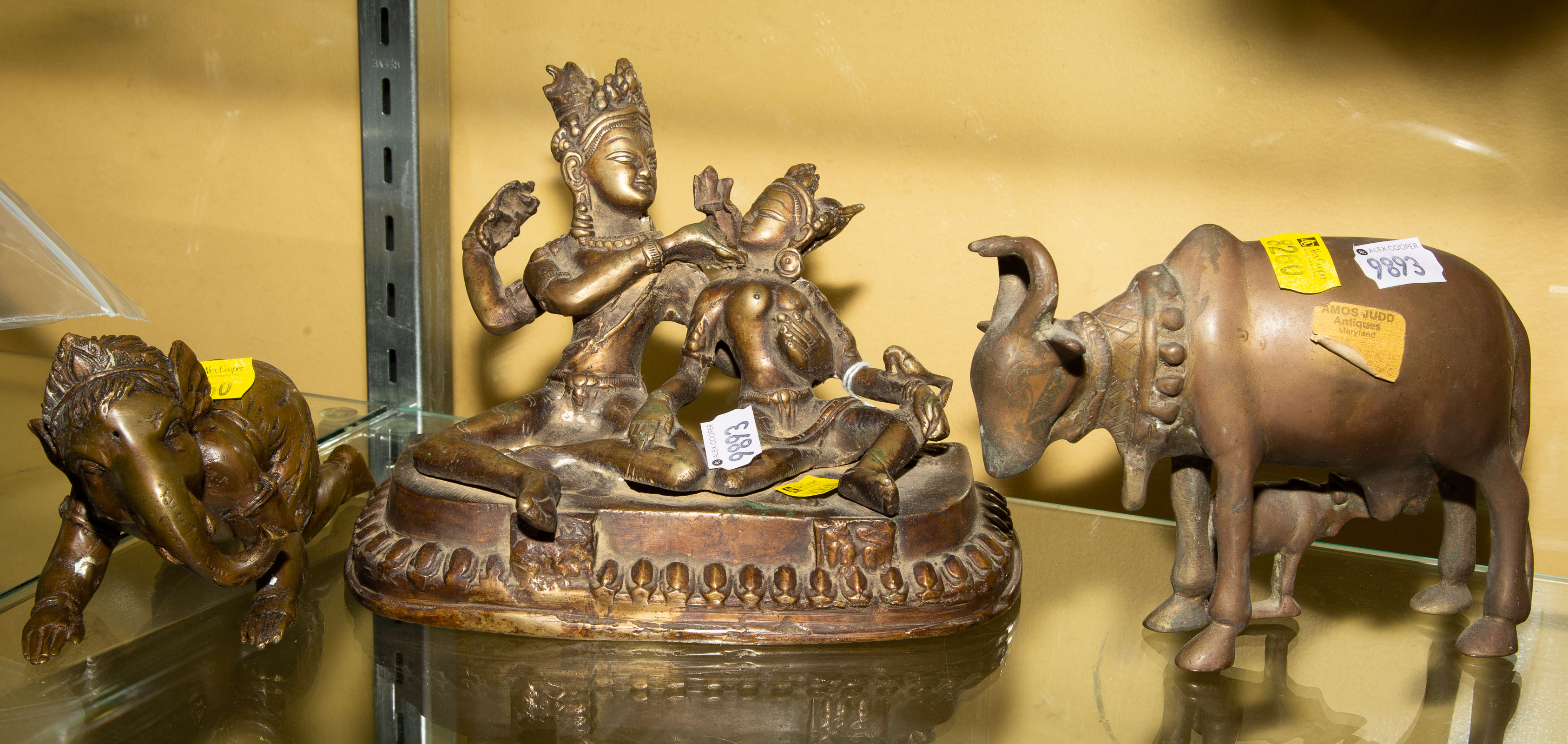 THREE CAST BRASS HINDU FIGURES .