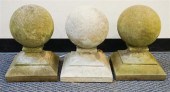 THREE CAST CEMENT CANNONBALL G