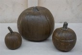 THREE CAST CEMENT PUMPKIN ORNA