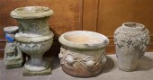 THREE CAST CEMENT URNS AND A L