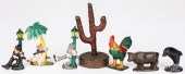 THREE CAST IRON DRUNK BOTTLE O