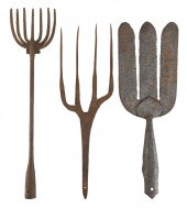 THREE CAST IRON EEL AND FISH S