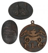 THREE CAST IRON FIRE MARKSAmer
