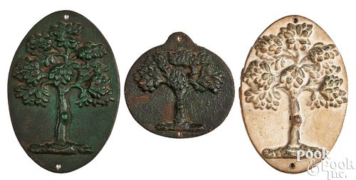 THREE CAST IRON GREEN TREE