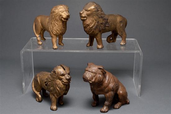 Three cast iron lion-form still