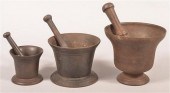 THREE CAST IRON MORTAL & PESTL