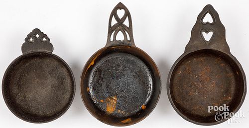 THREE CAST IRON PORRINGERS, 19TH
