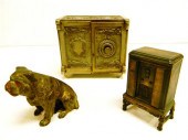 Three cast iron still banks in