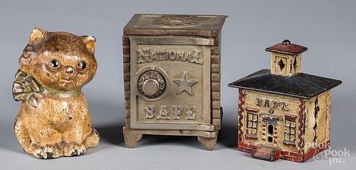 THREE CAST IRON STILL BANKSThree