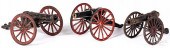 THREE CAST IRON TOY CANNONSThr