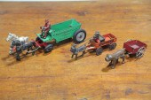 THREE CAST IRON WAGON TOYS.  A