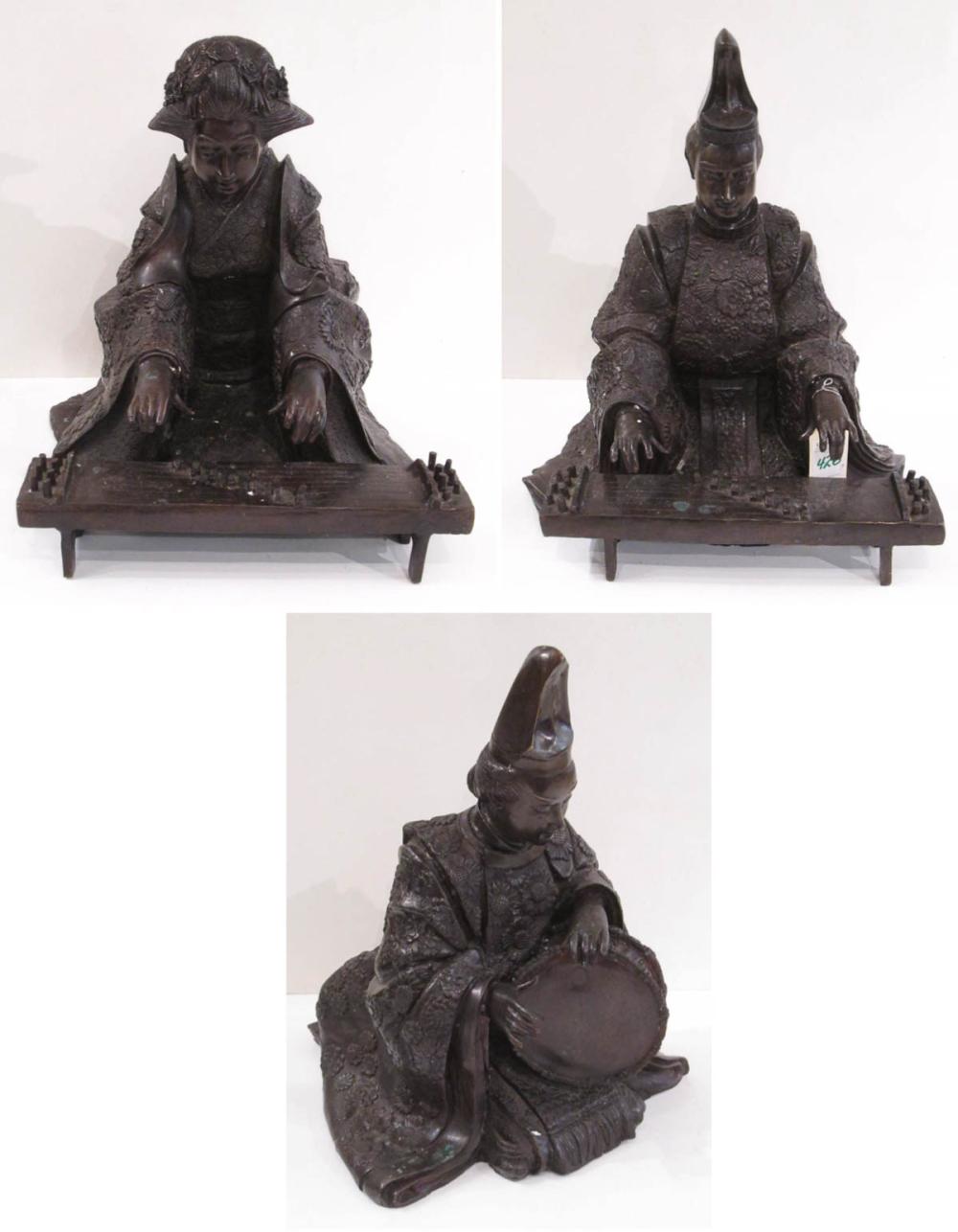 THREE CHINESE BRONZE SEATED MUSICAL