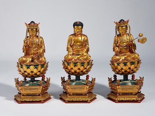 THREE CHINESE CARVED AND GILT