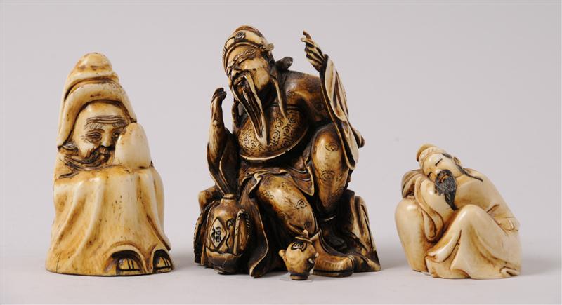 THREE CHINESE CARVED AND STAINED