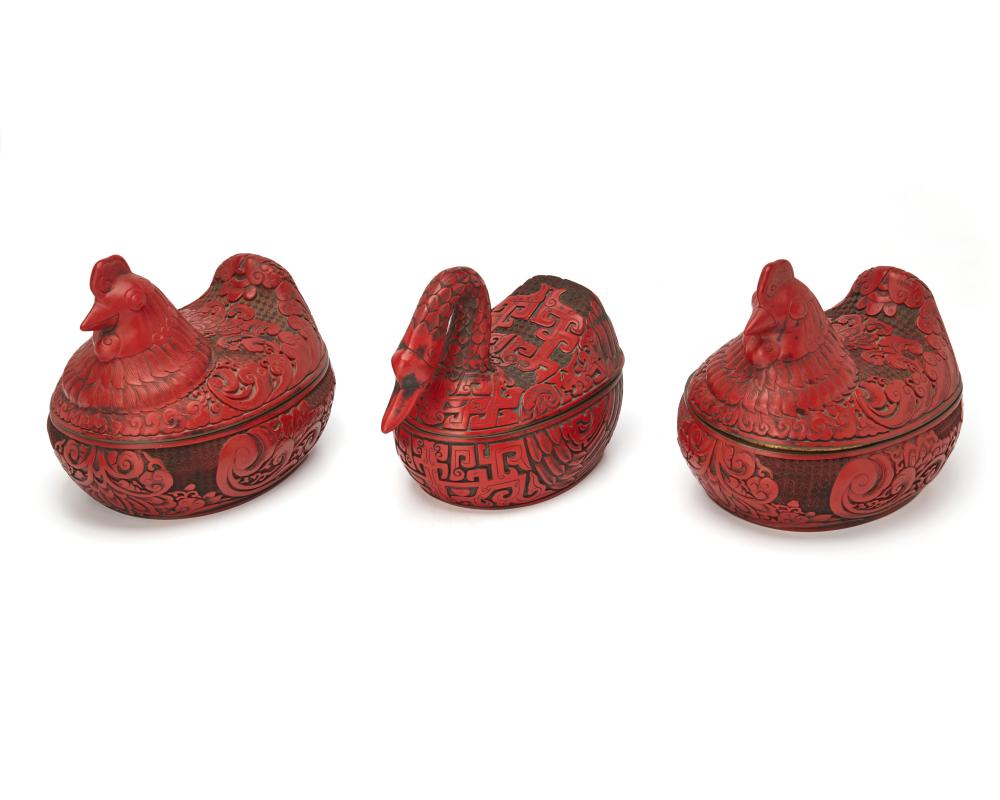 THREE CHINESE CARVED CINNABAR AVIAN
