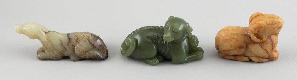 THREE CHINESE CARVED JADE RECLINING