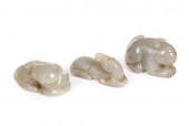 THREE CHINESE CELADON JADE PIE
