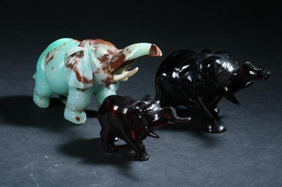 THREE CHINESE FIGURES OF ELEPHANTS.