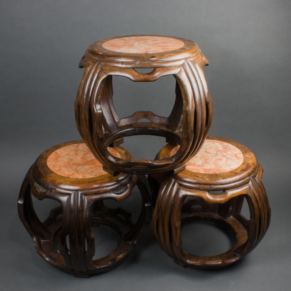 THREE CHINESE HARDWOOD GARDEN SEATS
