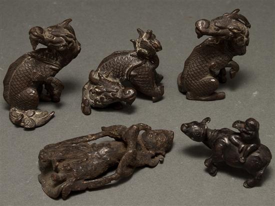 Three Chinese patinated bronze