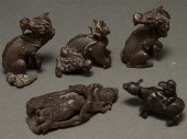 Three Chinese patinated bronze