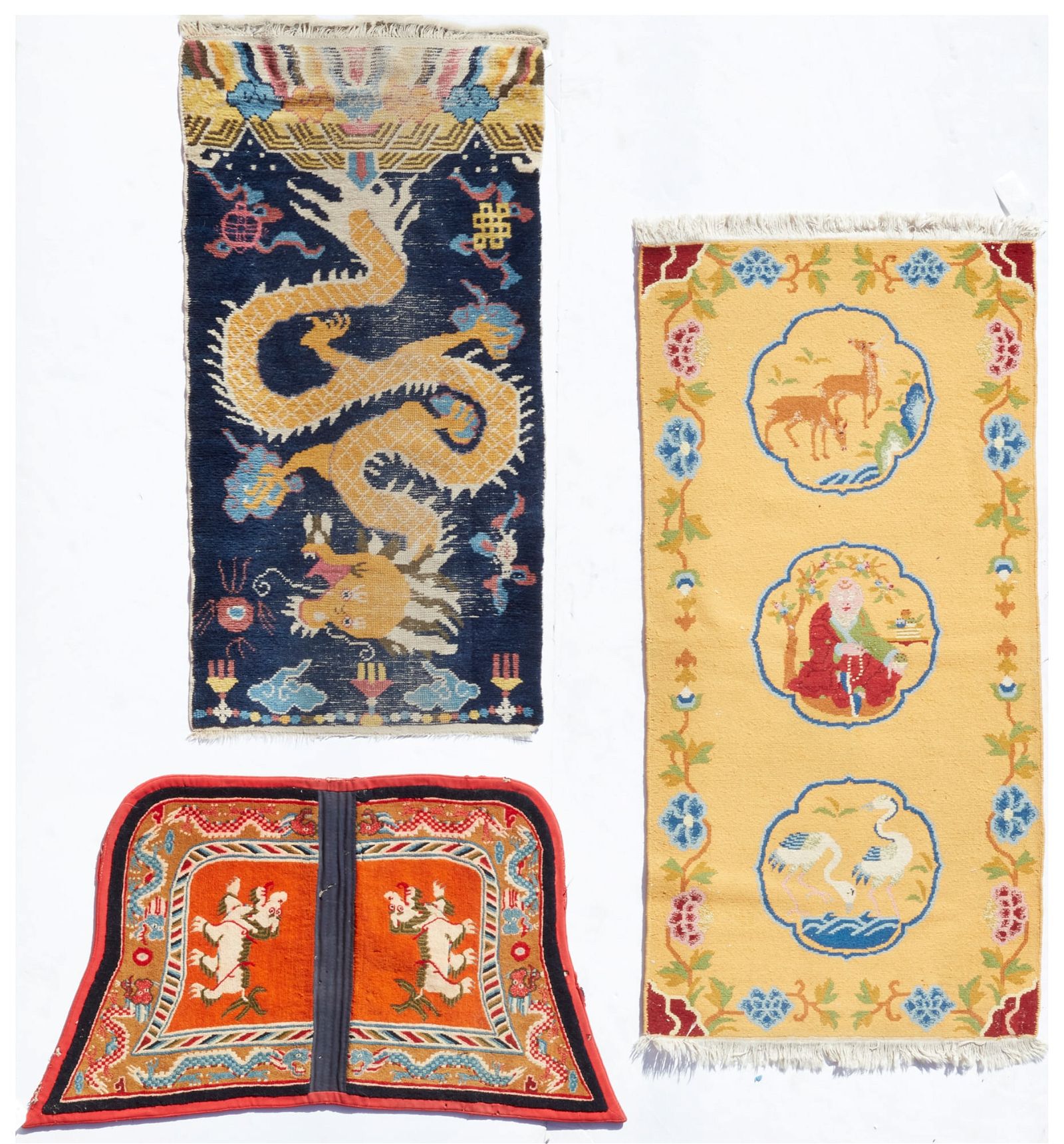 THREE CHINESE RUGS AND