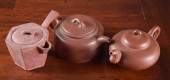 THREE CHINESE ZISHA TEAPOTS, E