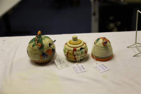 Three Clarice Cliff preserve jars