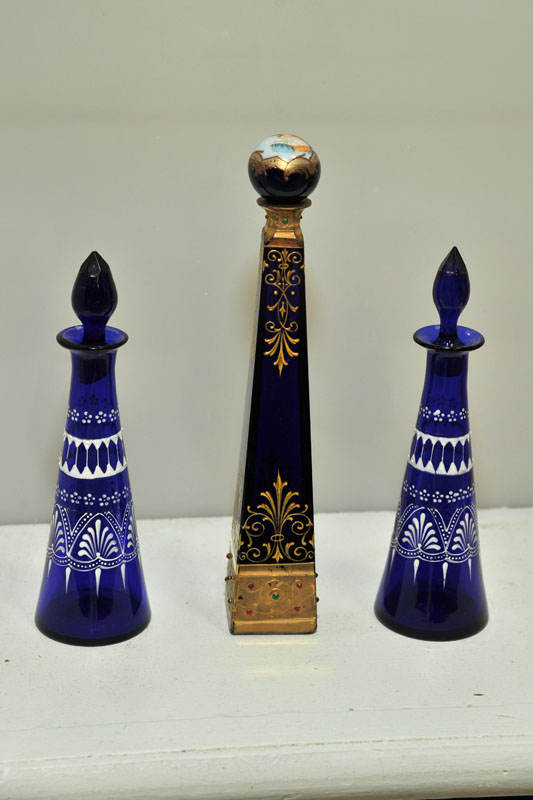 THREE COBALT PERFUME BOTTLES.