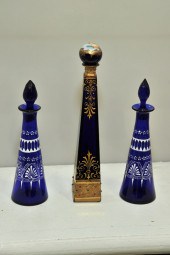 THREE COBALT PERFUME BOTTLES.