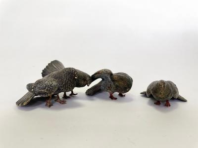 Three cold painted polychrome