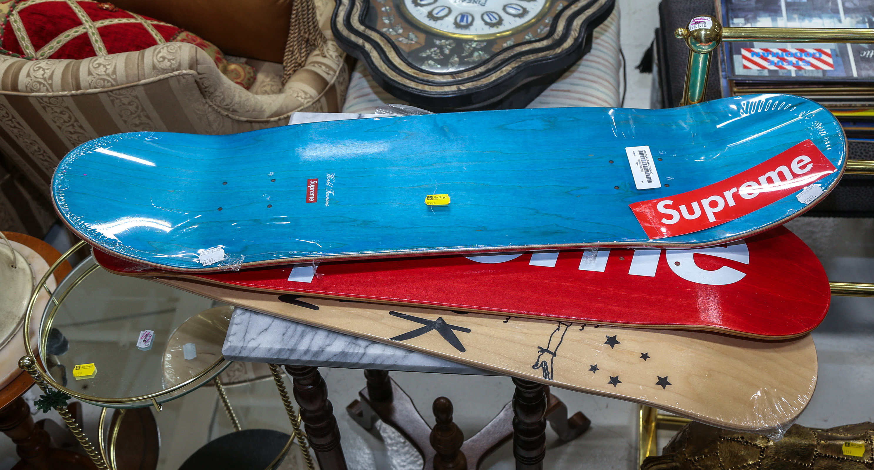 THREE COLLECTIBLE SKATEBOARD LONG