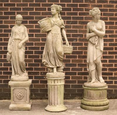 Three compositon stone figures of