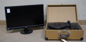 THREE COMPUTER MONITORS, A KEY