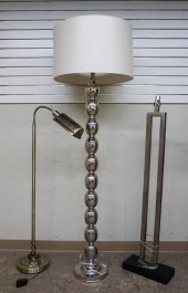 THREE CONTEMPORARY METAL FLOOR