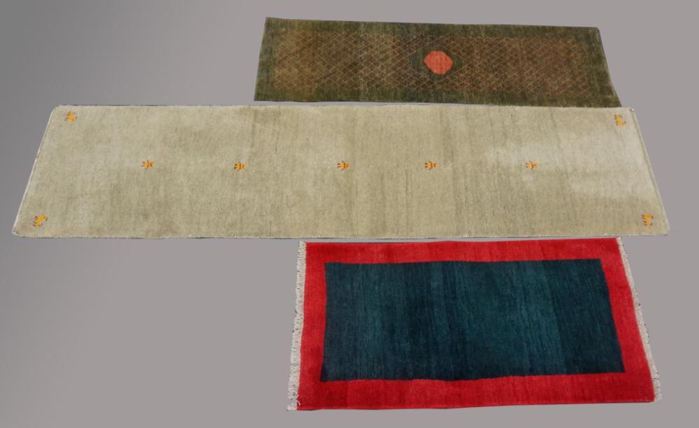 THREE CONTEMPORARY WOOL RUGSTHREE