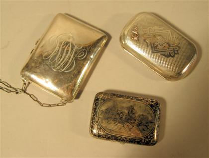 Three Continental silver cases   