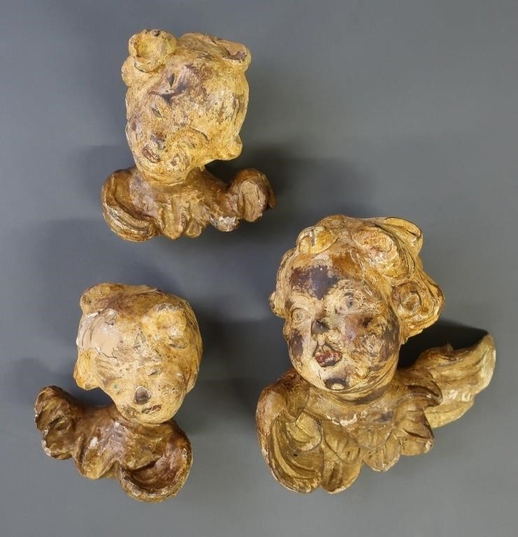 Three Continental style carved