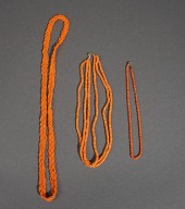 THREE CORAL BEADED NECKLACESTh