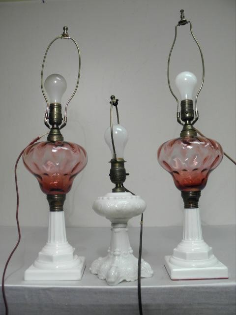 Three cranberry and milk glass
