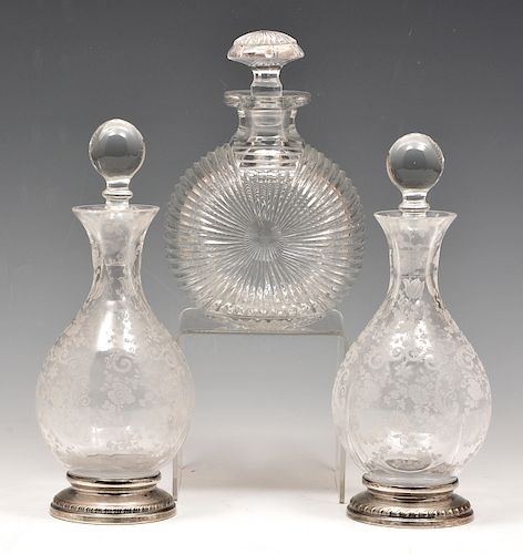 THREE CRYSTAL DECANTERSThree